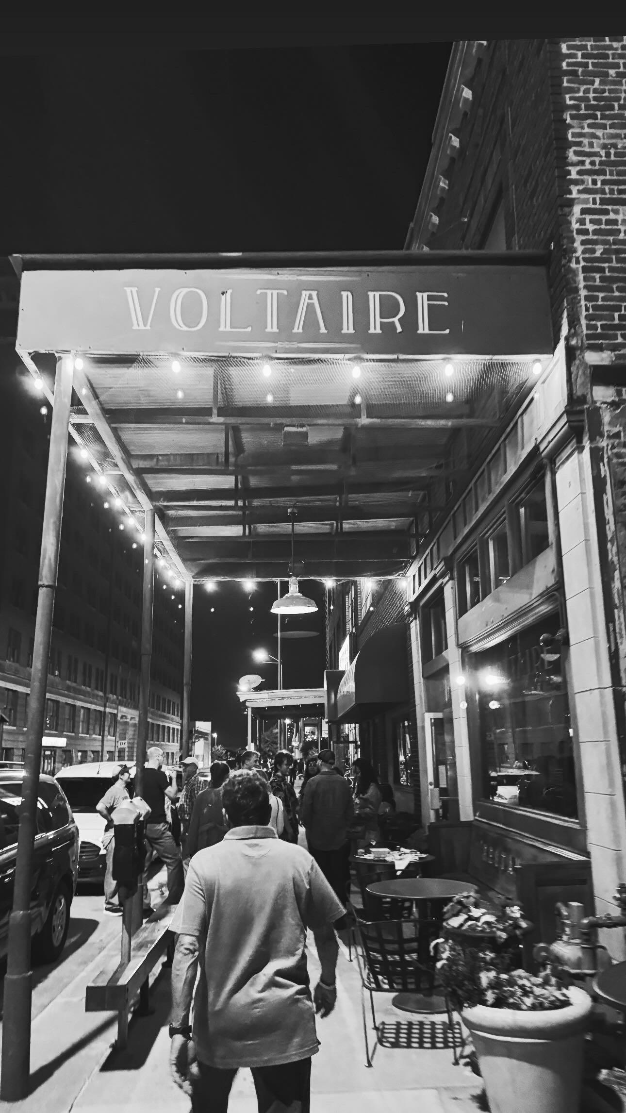 shows the outside of voltaire in black and white